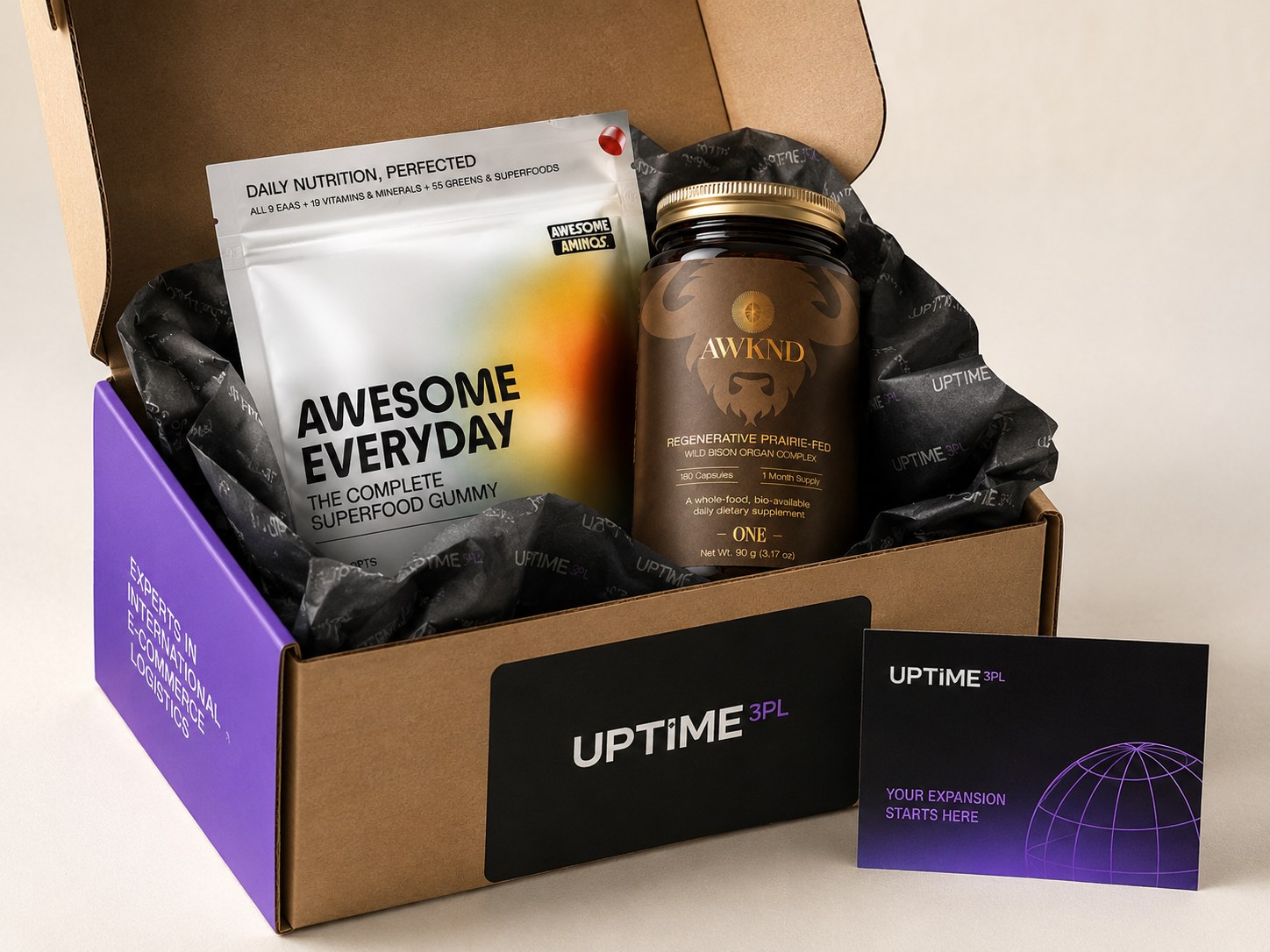 Awesome Aminos pouch and AWKND supplement jar packed in an Uptime kit box